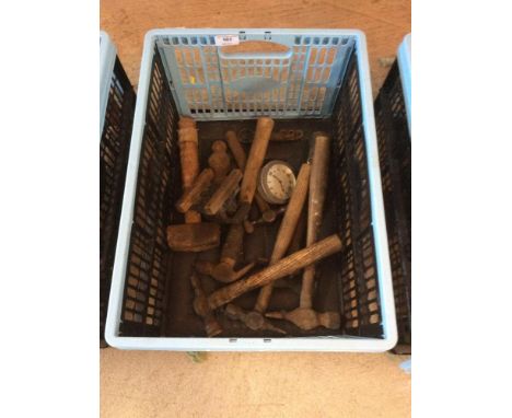 A box containing various old hammers; a clock etc.