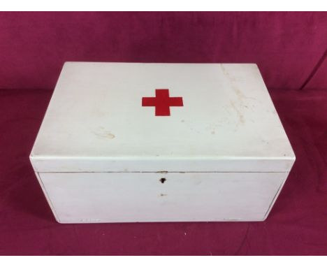 A vintage First Aid box and contents