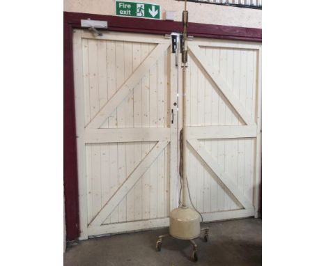 An industrial floor standing Angle Poise lamp for restoration