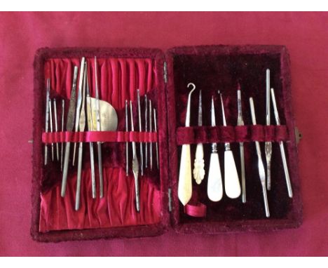 A collection of various needlework and manicure tools 