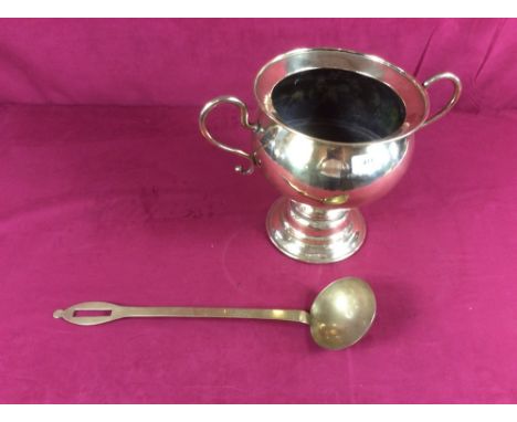 A 19th brass pedestal wine cooler; and a brass ladle