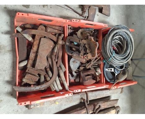 Three boxes of various old tools including sickles, axe heads, vintage oil can etc.