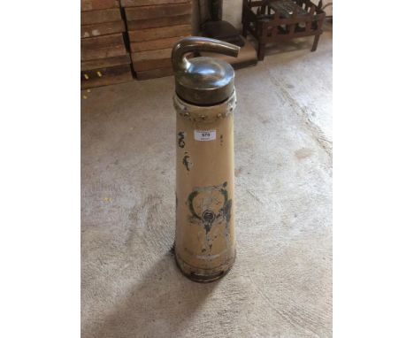 A vintage French fire extinguisher with brass cap