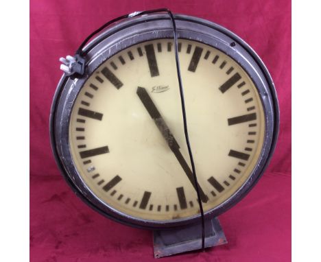 A large Ellitime electric double sided industrial clock