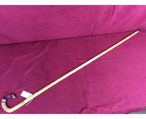 A walking stick, the horn handle decorated with a pheasants head