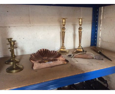 A pair of 19th Century brass candlesticks; an Art Nouveau design copper crumb scoop; a pair of small brass candlesticks; a vi