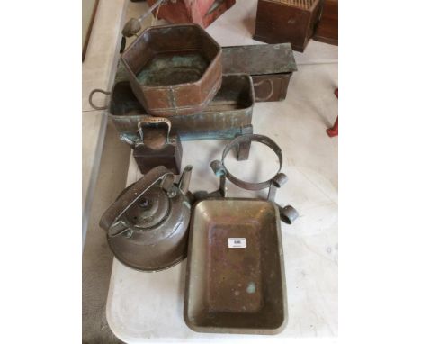 A quantity of copper and brass ware to include copper kettle, copper lamp, planters etc.