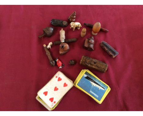 A collection of small treen and other items to include a hexagonal burr wood snuff box, Cunard playing cards, Netsuke etc.