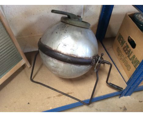 A vintage portable camping washing machine