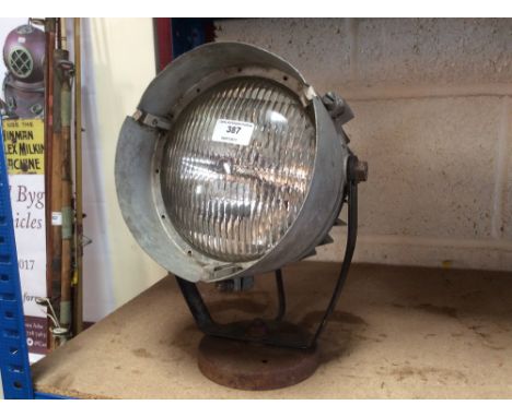 An aluminium lamp on stand (30cm high)