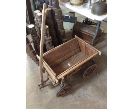 A vintage wooden dog cart