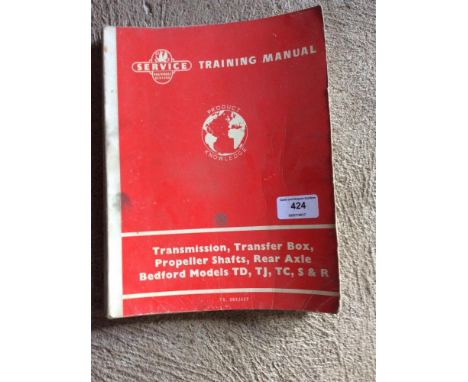 A collection of various old automobile manuals