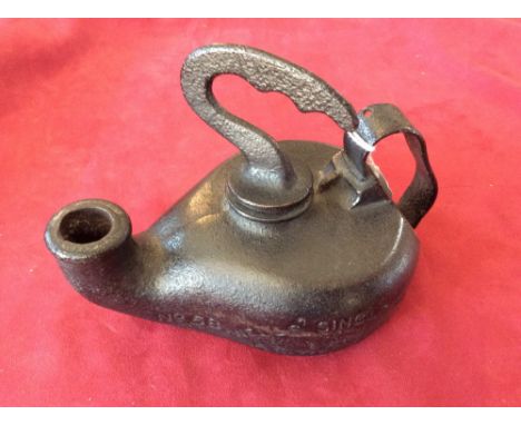 A vintage Wells single torch lamp No.58