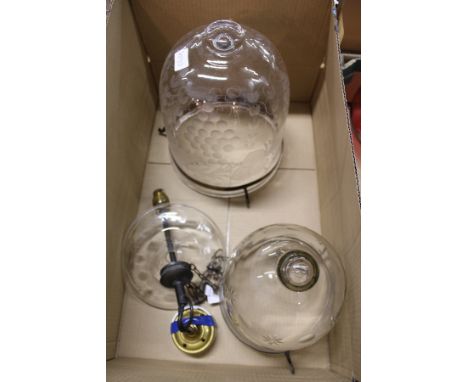 Two glass hanging lamp fittings / shades with etched and engraved decoration.