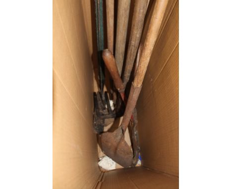 A quantity of old gardening tools.