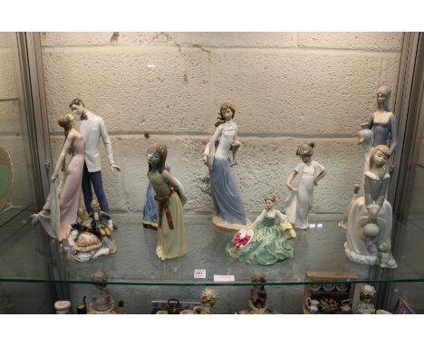 A quantity of Nao, Lladro and other decorative figures.