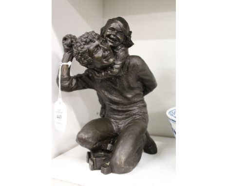 A composite figure of a girl playing on her father's back.
