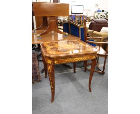 A continental marquetry games table with removable top, baize lined, playing surface, roulette wheel etc.