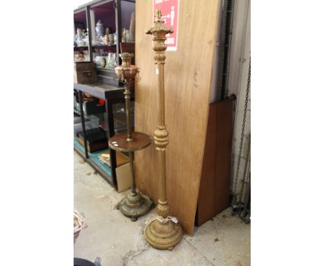 A gilt wood standard lamp.