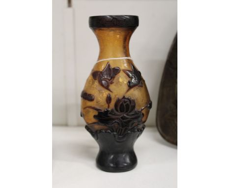 A Chinese Peking amber glass overlaid vase.