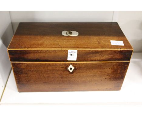 A George III mahogany tea caddy with fitted interior.