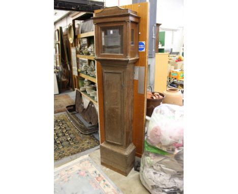 An oak longcase clock case (no movement).