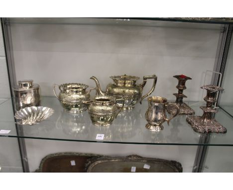 A good Elkington &amp; Co tea caddy, a shell shaped butter dish, a plated three piece tea service and other items.