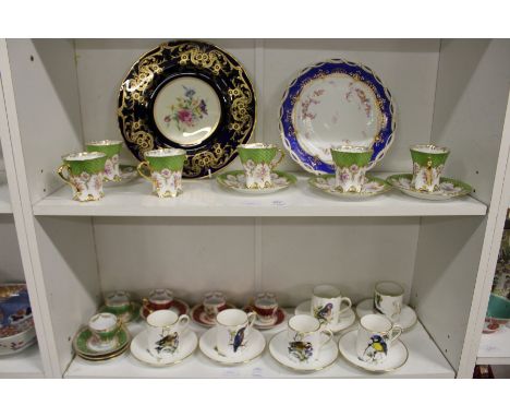 A quantity of decorative coffee cups and saucers and other china.