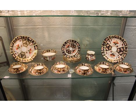 A quantity of Royal Crown Derby Imari pattern cups, saucers and plates etc.