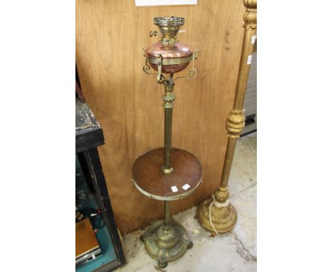 A brass and copper telescopic oil lamp / table.