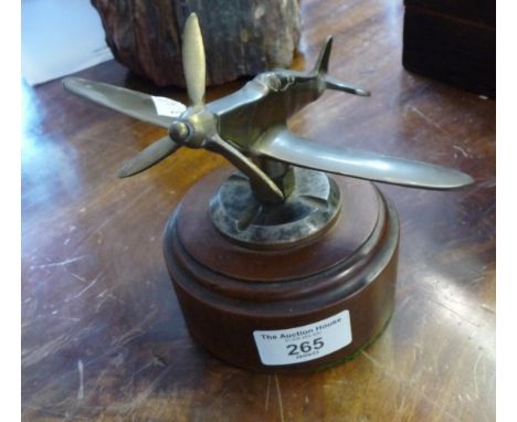 Brass model of WW2 Hurricane fighter plane mounted on turned mahogany plinth 