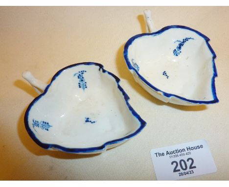 Pair of Georgian Caughley 'Locre Sprigs' blue and white leaf shaped butter dishes in the rare Decor a la Brindille pattern