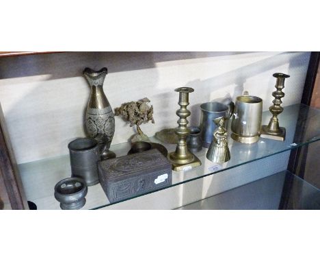 Shelf of old metalware, inc. pewter and brass 