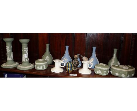 Wedgwood Jasper ware candlesticks, trinket boxes and vases (one shelf) 