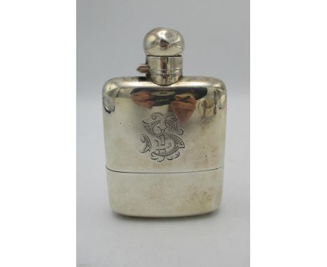 A late Victorian silver hip flask by James Dixon &amp; Sons, Sheffield 1900, the front monogrammed J.S, with full named engra