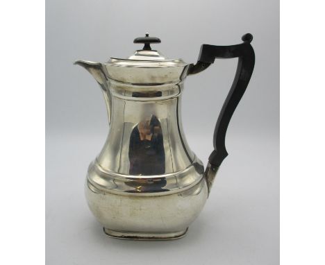 A George V silver coffee pot by William Hutton &amp; Sons, Sheffield 1911, with ebonised handle and finial, weight 741 g 