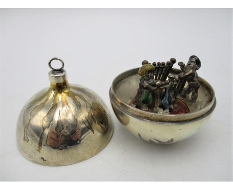 A Stuart Devlin novelty silver Christmas bauble, London 1985, the inside revealing children playing in a bedroom, with enamel