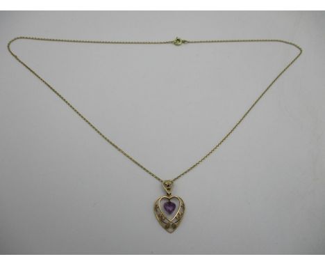 A 14ct gold fine necklace 1.5g, with a 9ct gold heart shaped filigree pendant, set with amethyst, 1.2g 