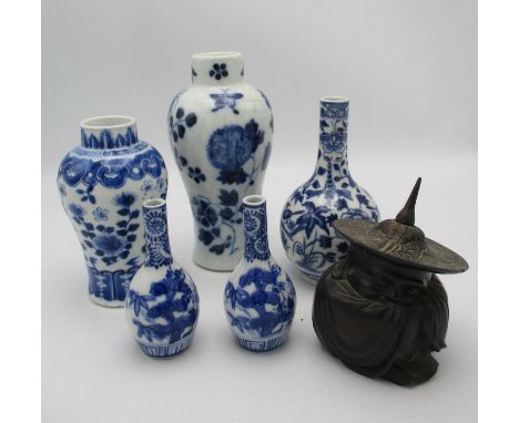 A small collection of blue and white Chinese porcelain vases, to include a small Yuan style baluster vase, a Kangxi style bot