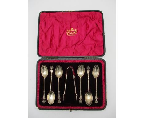 A cased set of Edwardian silver teaspoons by William Hutton &amp; Sons, London 1902, modelled with shell finials, together wi