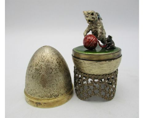 A Stuart Devlin novelty silver gilt surprise egg, London 1986, the inside revealing a cat and mouse unravelling a yarn of woo