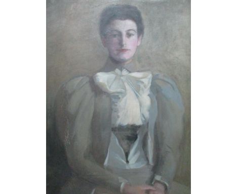 British School - early 20th century - a half length portrait of a woman with her hands in her lap, wearing a grey jacket and 