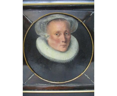 17th/18th century European School - a head and shoulder portrait of a woman wearing a forehead cloth and a ruff, oil on panel