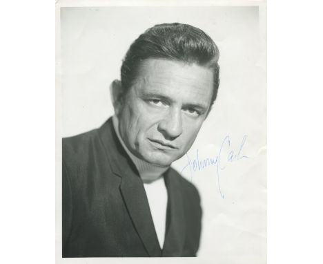 CASH JOHNNY: (1932-2003) American Singer. A good vintage signed 8 x 10 photograph of the singer in a head and shoulders pose.