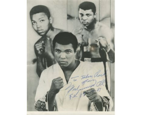 ALI MUHAMMAD: (1942-2016) American Boxer, World Heavyweight Champion. Signed and inscribed 7.5 x 10 photograph of Ali standin