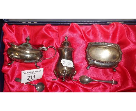 Silver cruet set in case