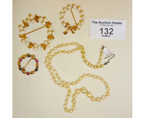 14ct gold and pearl brooch (the largest), another 9ct similar, 9ct brooch set with sapphires and rubies, and a pearl necklace