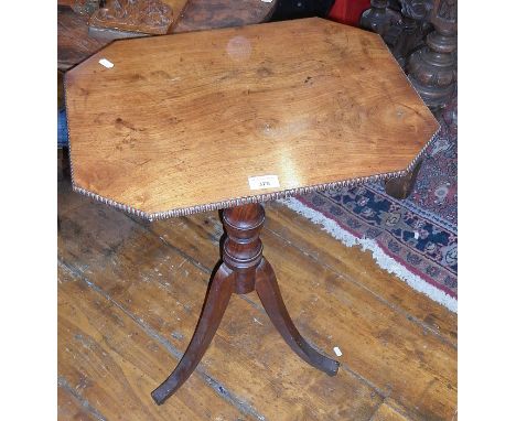 Regency mahogany occasional table with turned centre column above elongated tripod legs