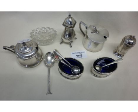Two silver pepper pots, mustard and salt spoons and silver-plated cruets