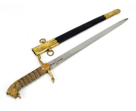 A Victorian midshipman's dirk with shagreen grip, lions head pommel and leather with brass mounted scabbard, length 61cm.